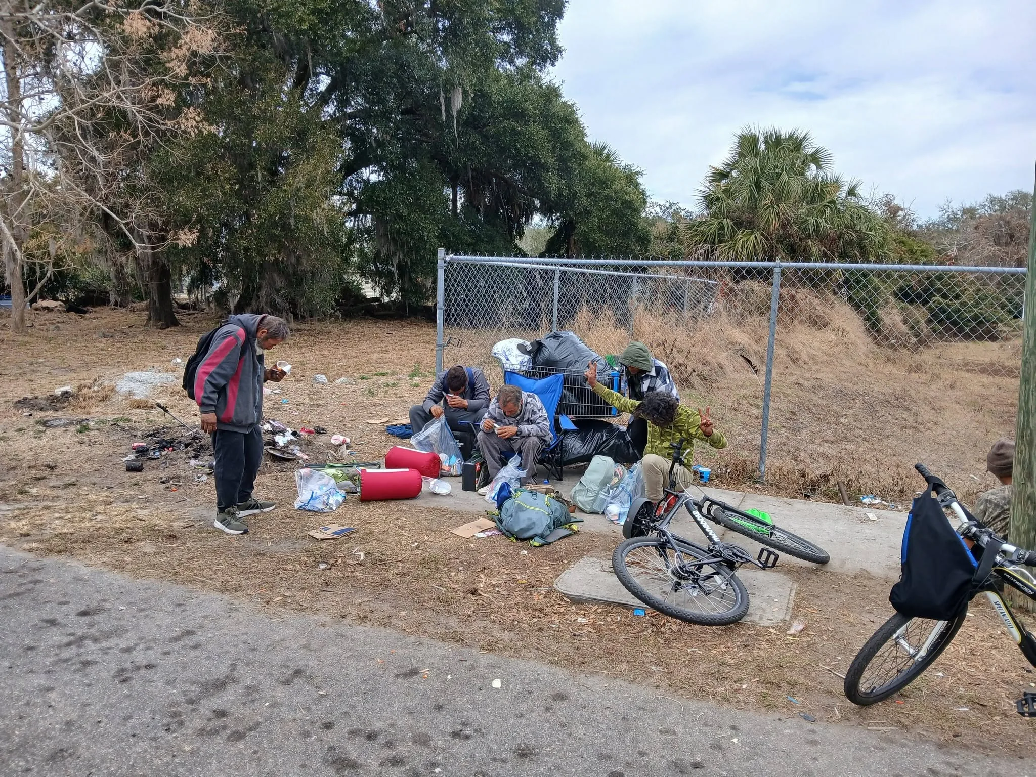 Outreach with people gathered on a street corner